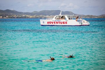 a small boat in a large body of water