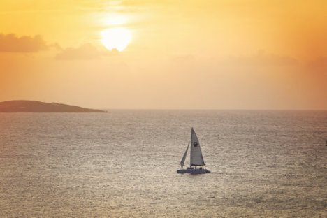 a boat in the middle of a body of water