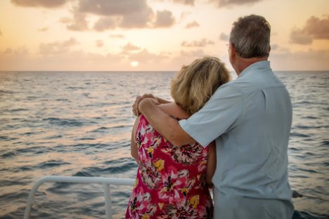 a person standing in front of a body of water