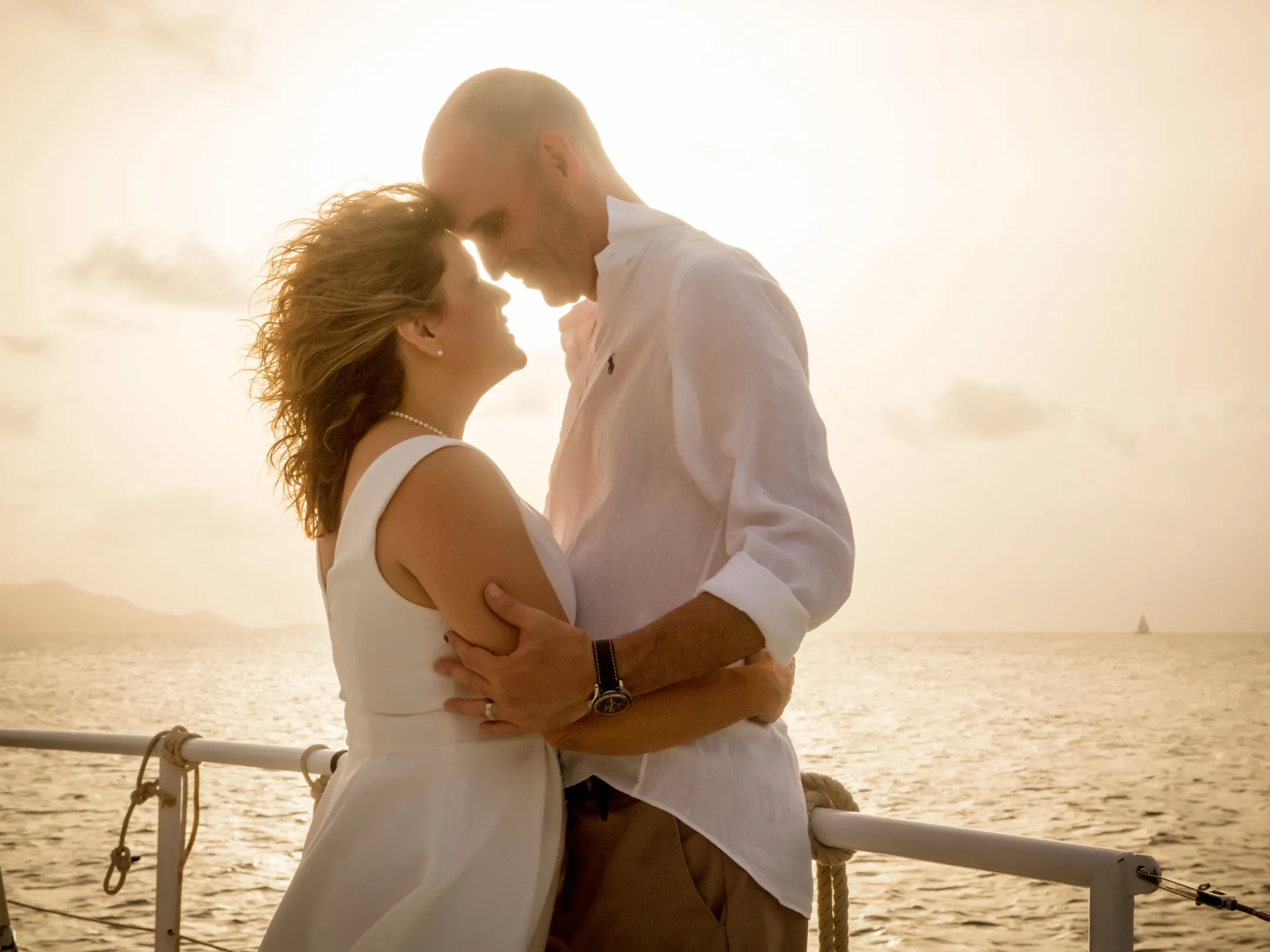a person standing in front of a body of water