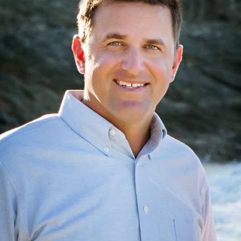 a man wearing a blue shirt